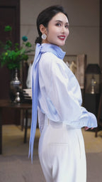 Light Blue Zip-Front Crop Shirt with Feather Detail