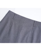 Mid-length front and back slit skirt with waist support